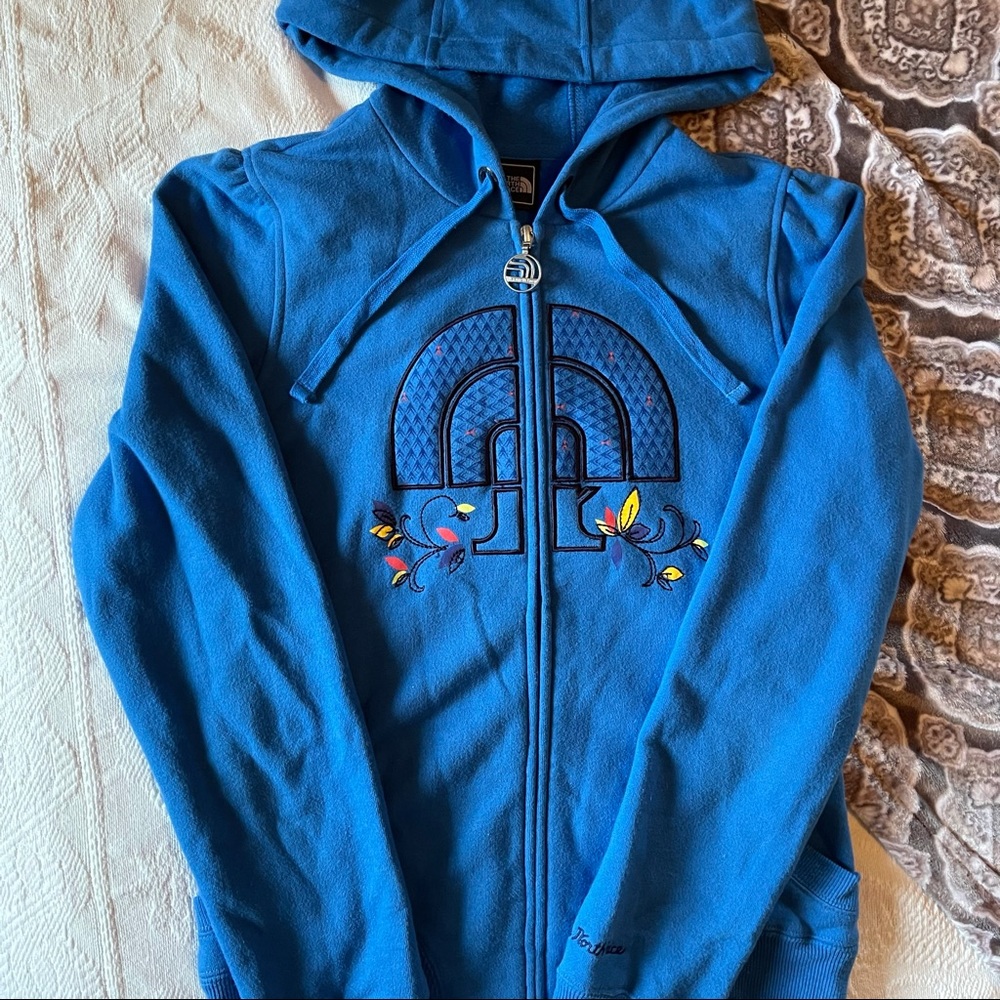 The North Face blue zip up sweatshirt hoodie with cute floral accents
